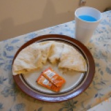 Homemade quesadilla and KoolAid with not-so-homemade Taco Bell sauce